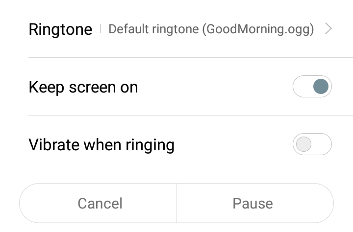 there are 2 buttons that are 2cm from the bottom. the cancel button is on the left and the pause/continue button is on the right. there are three extra buttons above these 2. vibrate when ringing, keep screen on and default ringtone